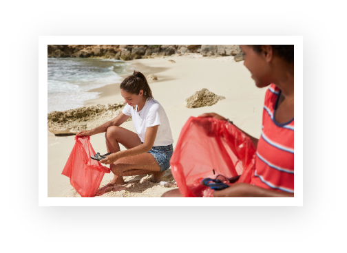 Volunteers cleaning a beach.